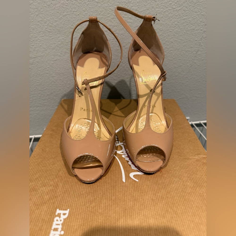 Authentic Christian Louboutin nude heels size 37 great condition.
